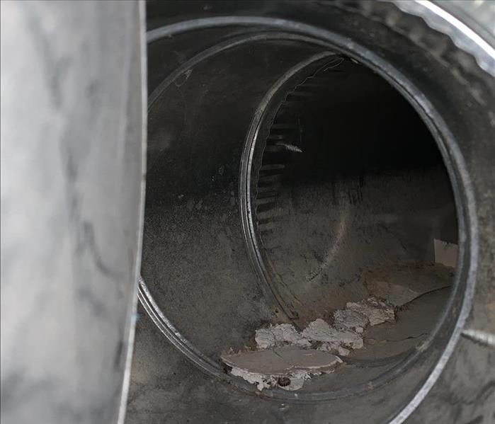 Duct work dirty with dust and debris 